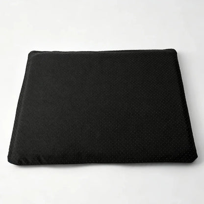 Black cushion cover on a white background.
